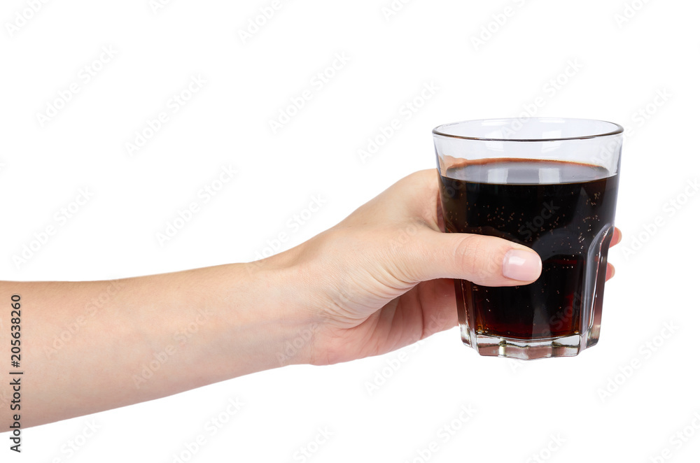 Cola drink in glass with hand isolated on white background Cola drink in glass with hand isolated on white background