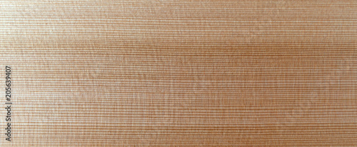 Wide view of a polyurethane coated western red cedar board. photo