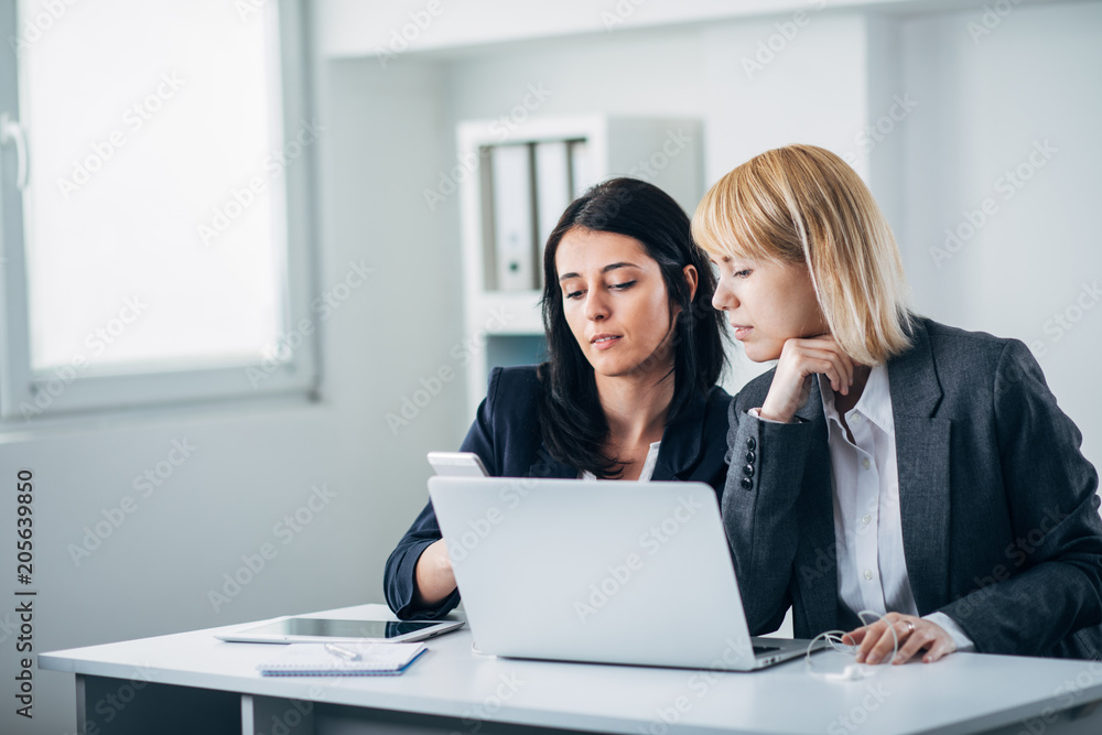 Colleagues working in office Colleagues working in office
