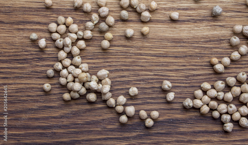 raw organic chickpeas in a wooden plate Natural organic bean raw organic chickpeas in a wooden plate Natural organic bean