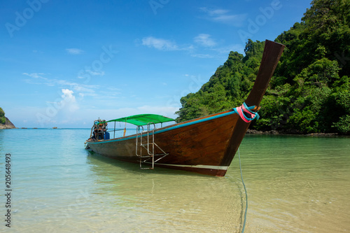 Long tail boat on the beach.Wonderful background.
