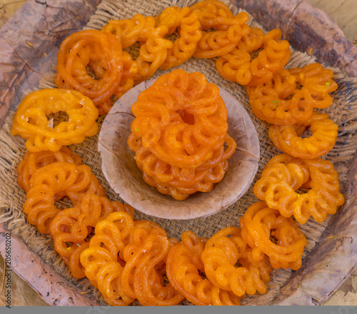 Indian Traditional Sweet Imarti Also Know as Amriti, Omriti, Jahangir, Jalebi, Jaangiri. It is Mde by Deep-Frying Vigna Mungo Flour Batter in a Kind of Circular Flower Shape. photo