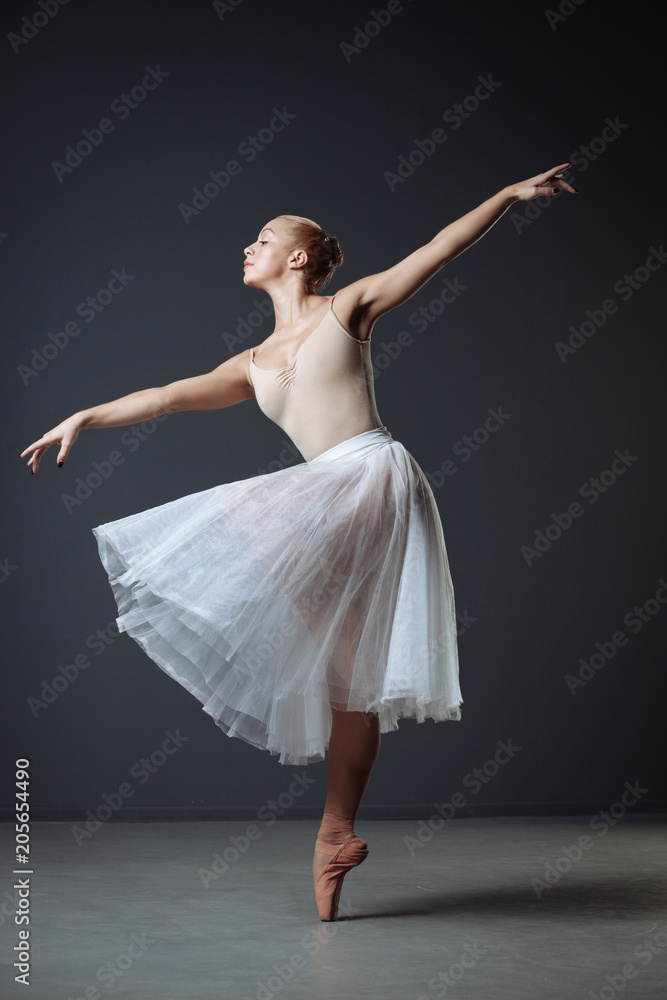 Beautiful diligent dancer dancing and doing graceful movements. Beautiful diligent dancer dancing and doing graceful movements.