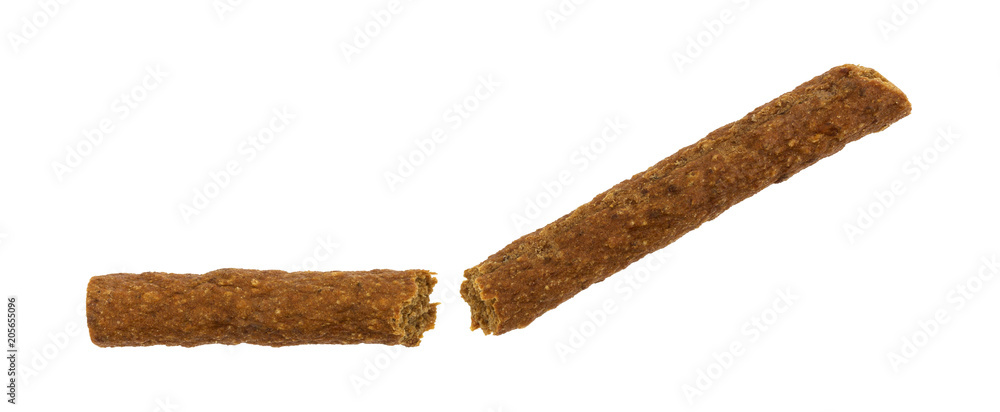 Broken beef stick on a white background. Broken beef stick on a white background.