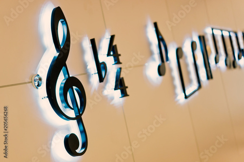 Canvas Print musical notes are light, decorated with light on the wall.