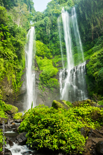 Sekumpul waterfall in Bali surrounded by beautiful tropical forest