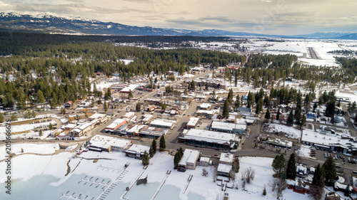 High elevation overhead view of McCall Idaho with mountains and snow on the ground
