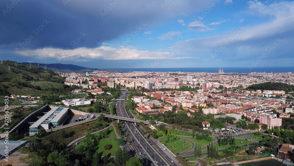Barcelona, Spain. Aerial view of the city and the highway in the evening