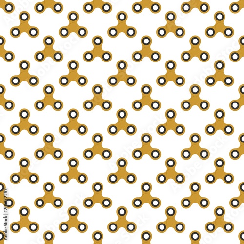 Gold colorful fidget spinner with silver bearings on a white background. Modern children's hand spinning toy 