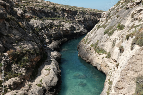 Malta 2018 - blue lagoon between high cliffs at Gozo island, Wied il Ghasri
