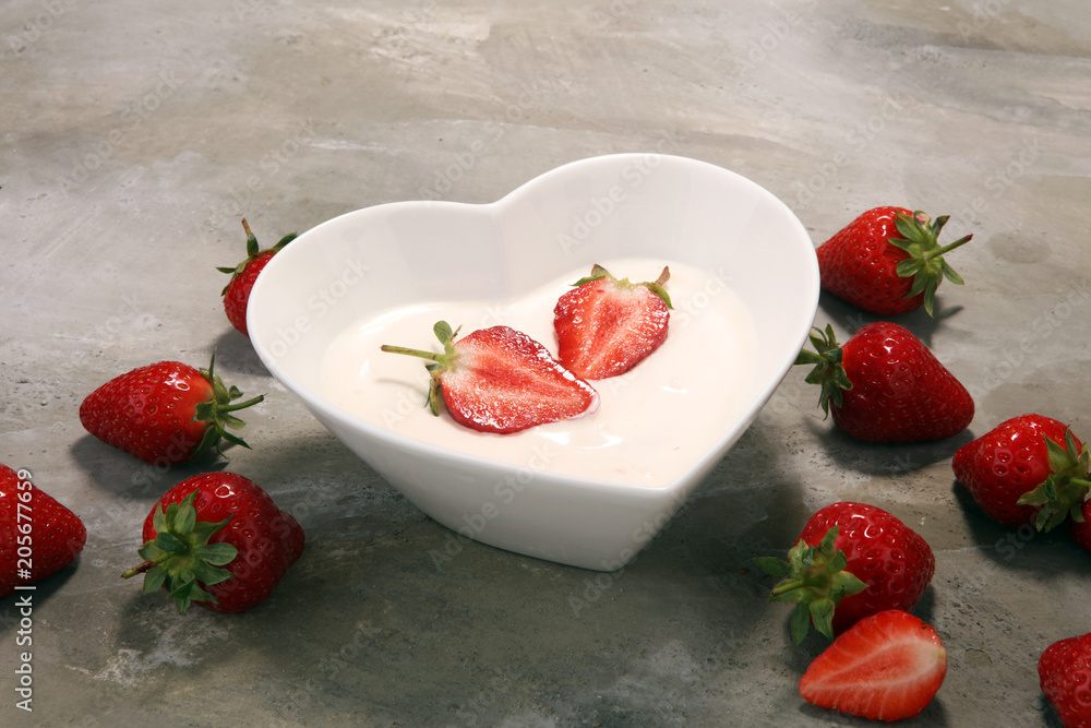 strawberry yogurt in bowl with fresh strawberries strawberry yogurt in bowl with fresh strawberries