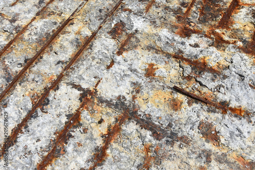 Canvas Print Rough weathered rusty surface of reinforced concrete floor