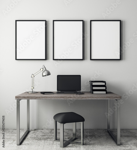 Contemporary interior with laptop and banner
