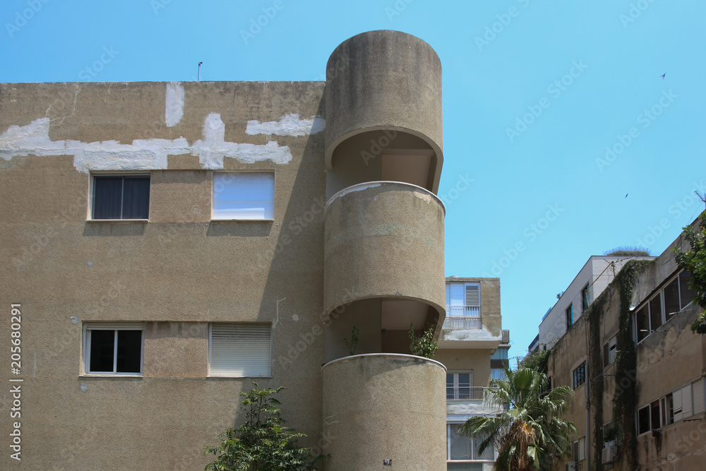 Tel Aviv, Israel - May 15, 2018: View of one of the 4000 buildings of the White City in Tel Aviv. The houses around Bauhaus style belong to the Unesco world cultural heritage.