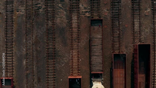 Old and rusty industrial train tracks drone shot