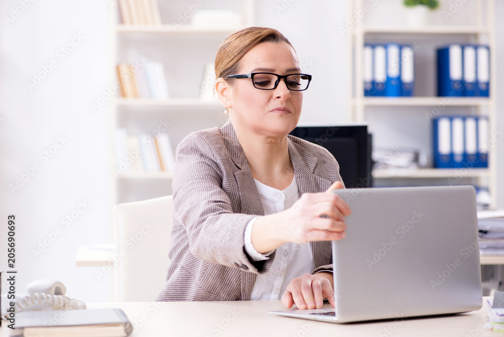 Businesswoman employee working in the office Businesswoman employee working in the office