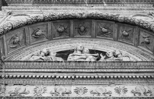 Detail of the carved facade of an Italian medieval church.