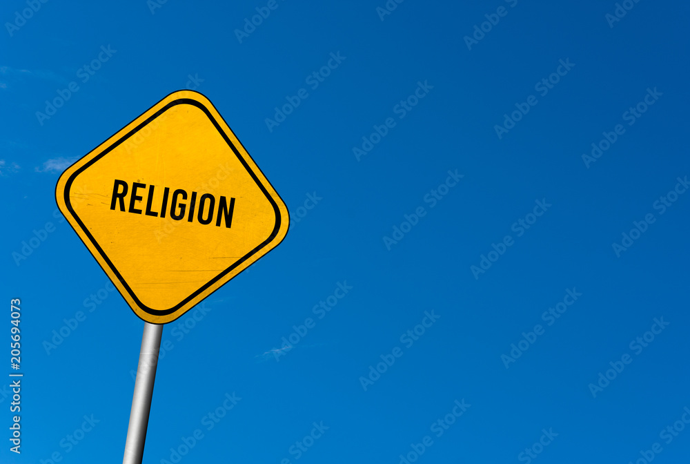 religion - yellow sign with blue sky religion - yellow sign with blue sky