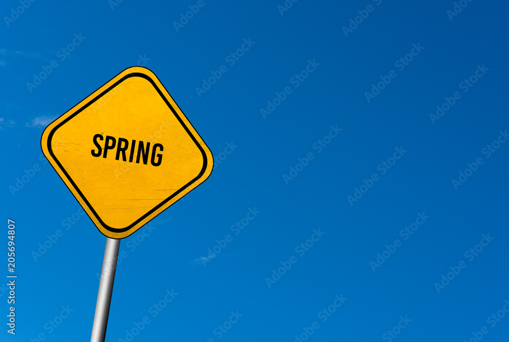 Spring - yellow sign with blue sky Spring - yellow sign with blue sky
