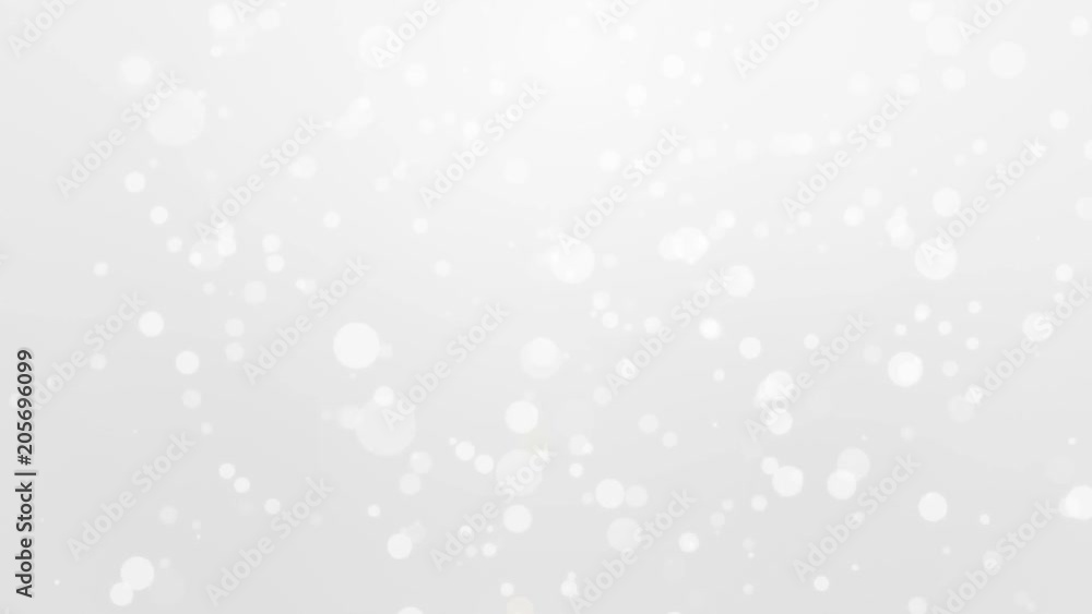 Glowing white bokeh background with floating light particles. Glowing white bokeh background with floating light particles.