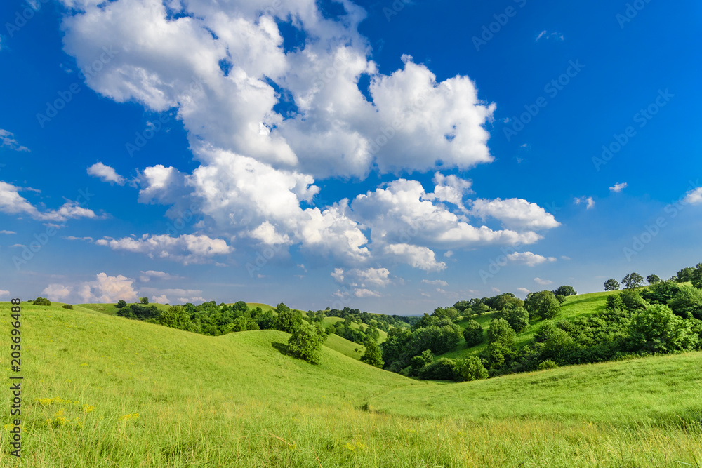Beautiful landscape of green hills and sky