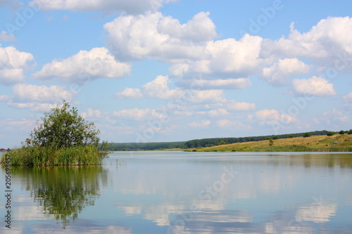Fototapeta Naklejka Na Ścianę i Meble -  quiet lake in the afternoon and clouds