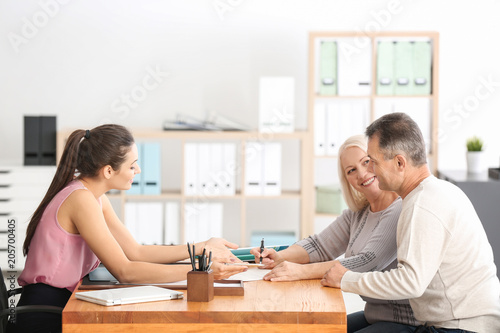 Mature couple at notary public office