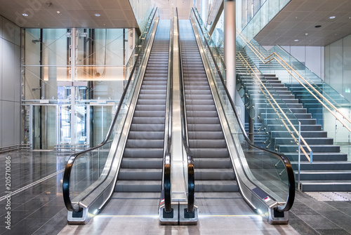 Modern luxury escalators with staircase photo