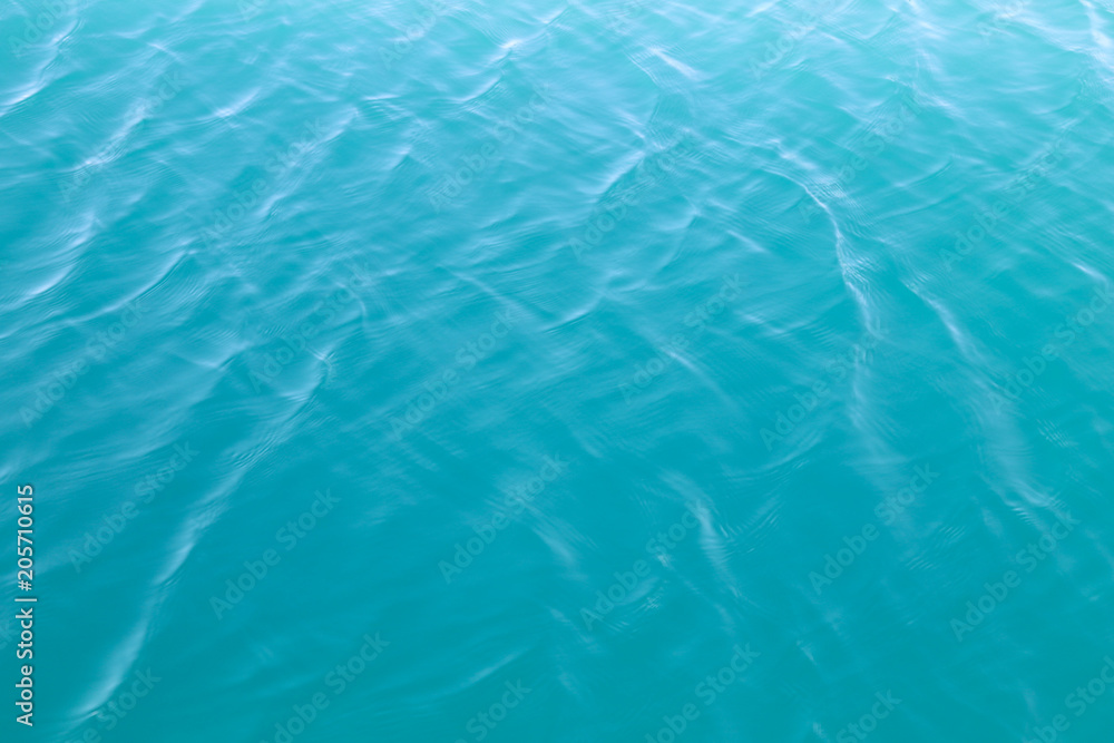 Clear blue sea water surface in sunny day of summer. Clear blue sea water surface in sunny day of summer.