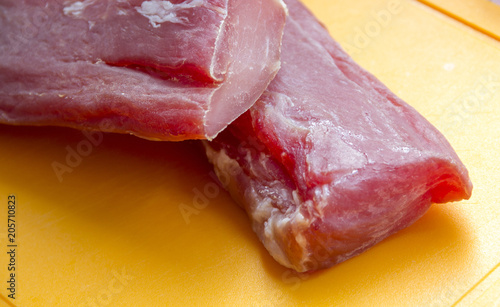 Obraz na płótnie Raw meat. The pieces are on the cutting Board w salonie