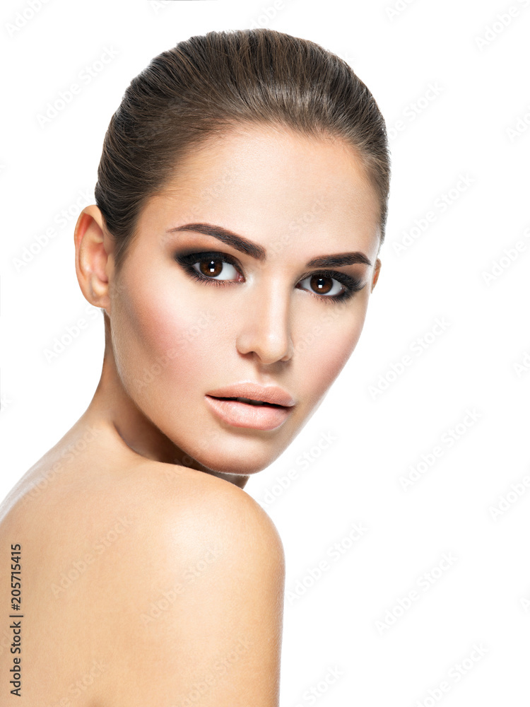Fototapeta premium Beautiful face of young woman with perfect health fresh skin
