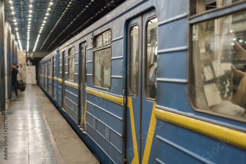Metro train on the platform. Blue subway train on the underground station. selected focus © jollier_