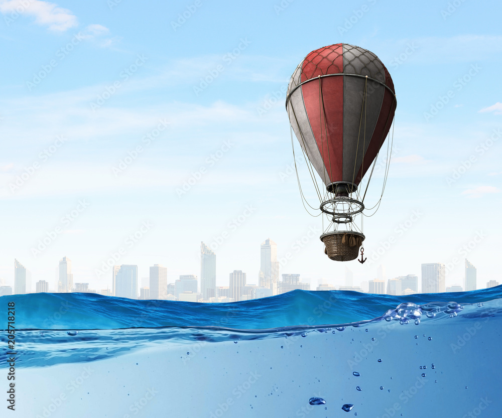 Air balloon over water. Mixed media