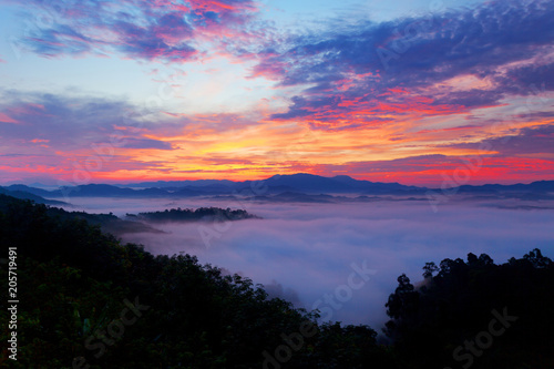 Beautiful sunrise or sunset with fog flowing in the mountain beautiful landscape scenery view in thailand.