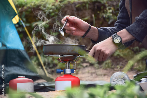 Breakfast in front of the tent in the morning,defocus background