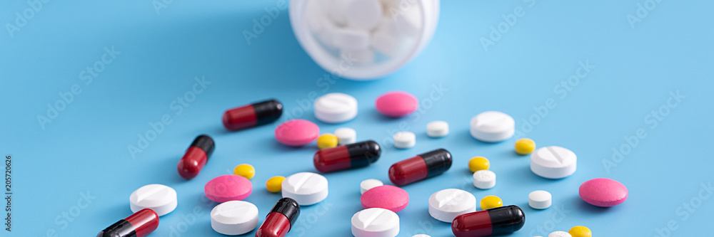 medicine  pills on blue background Copy space for text Assorted pharmaceutical Healthy Eating, Lifestyle