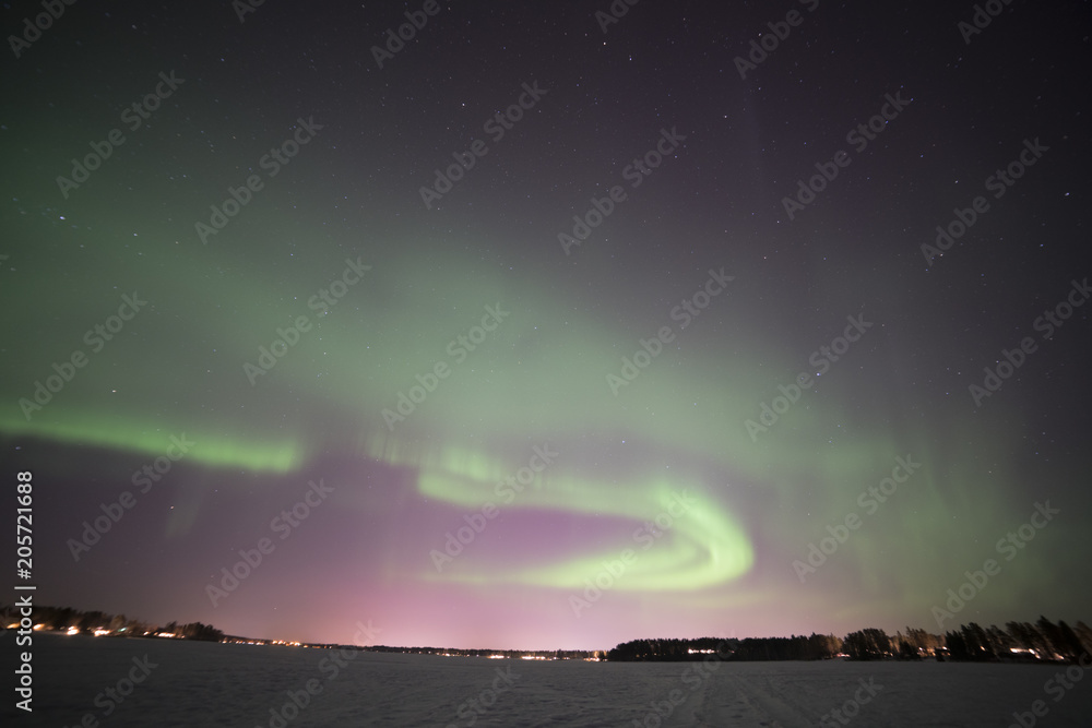 north light aurora on night sky at swedish countryside, north of country, winter lake