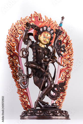 Red Tara in Vajrayogini's shape in a semi-angry form with the golden face and a knife cutting attachments. 