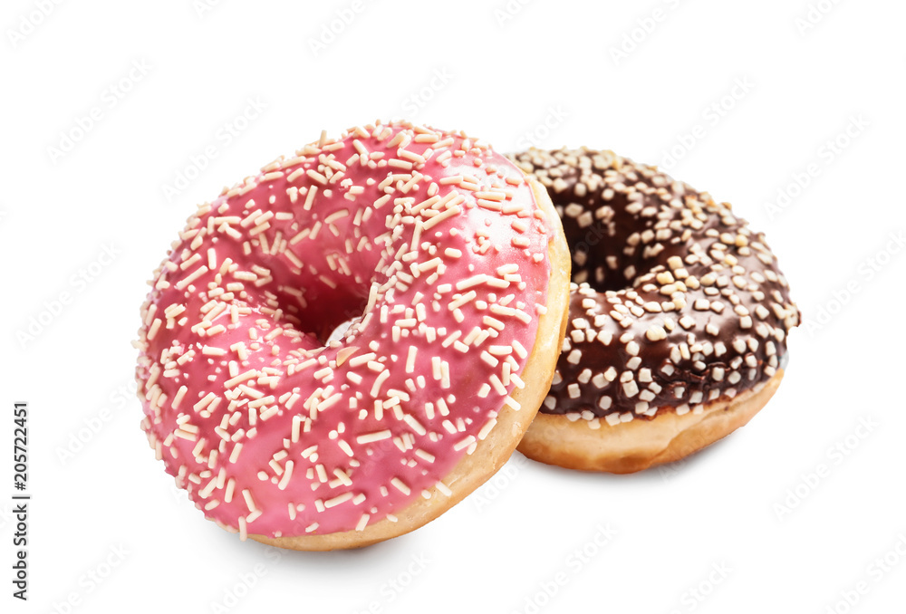 Delicious glazed doughnuts with sprinkles on white background Delicious glazed doughnuts with sprinkles on white background