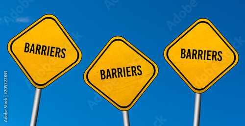 Barriers - yellow sign with blue sky