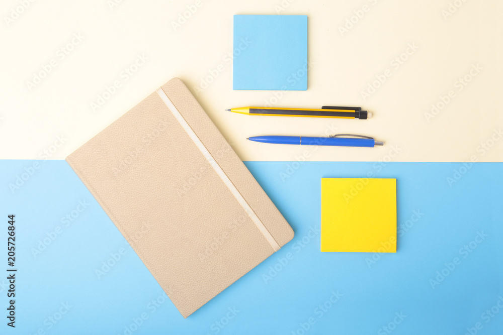 Notebook, pen, pencil and other supplies for business office. Copy space. Top view. Notebook, pen, pencil and other supplies for business office. Copy space. Top view.