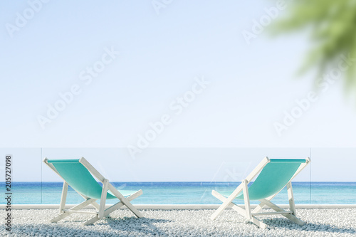 Fototapeta Naklejka Na Ścianę i Meble -  Two deck chairs on the beach