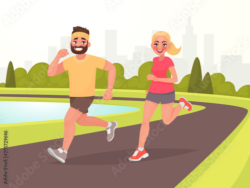 Happy couple running around in the park. Man and woman is engaged in fitness