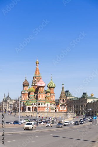 Moscow,Russia, St. Basil's Cathedral and Kremlin Walls and Tower in Red square in sunny blue sky. Red square is Attractions popular's touris in russia