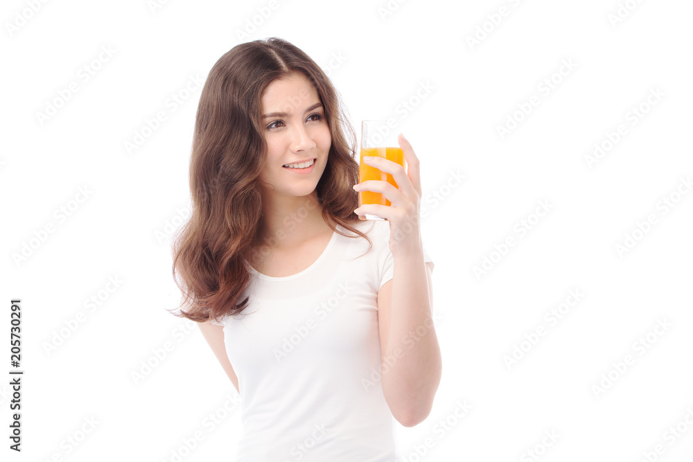 Portrait of a woman drinking orange juice. Orange juice in glass Portrait of a woman drinking orange juice. Orange juice in glass