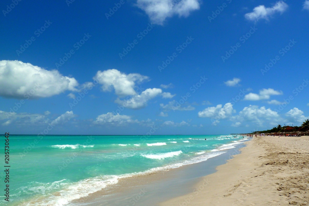 Tropical beach, sea, waves and sky with clouds Tropical beach, sea, waves and sky with clouds
