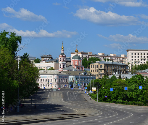 Moscow, Russia - Ustinsky passage with view of Church of Holy Apostles Peter and Paul photo