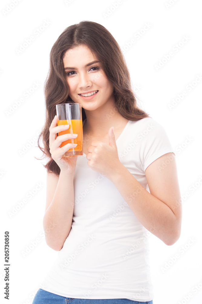 Portrait of a woman drinking orange juice. Orange juice in glass Portrait of a woman drinking orange juice. Orange juice in glass