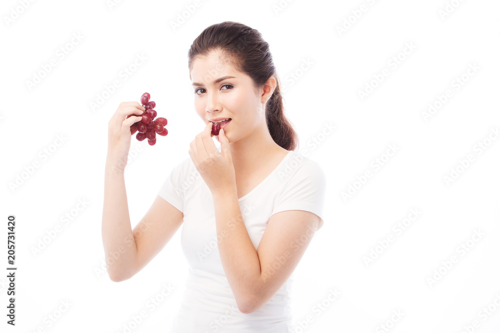 Asian Woman diet concept portrait with red grape fruit Asian Woman diet concept portrait with red grape fruit