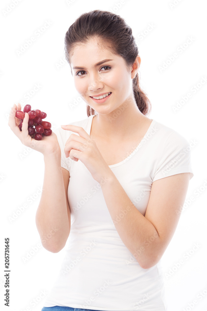 Asian Woman diet concept portrait with red grape fruit Asian Woman diet concept portrait with red grape fruit